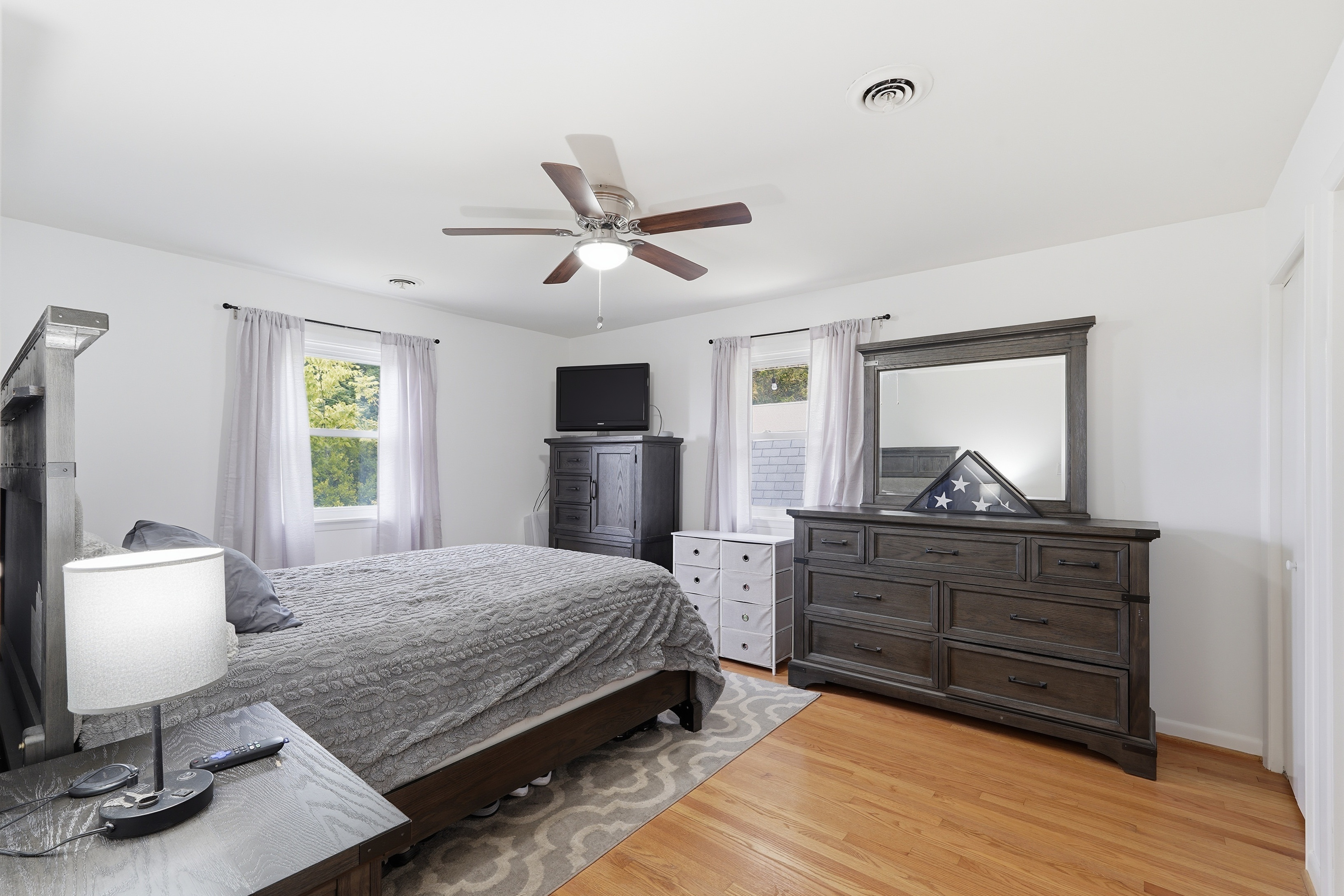 7717 McKaig Road Frederick, MD 21701 - Photo 19 of 53 a bedroom with a bed and a chandelier