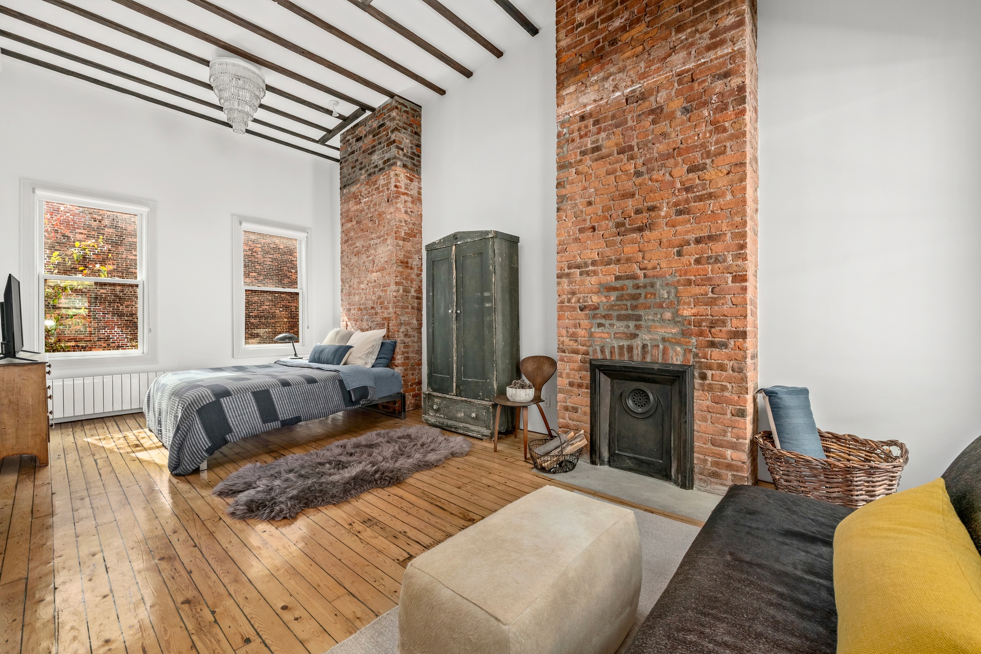 8 Sylvan Terrace Manhattan, NY 10032 - Photo 11 of 19 a bedroom with a bed and a couch