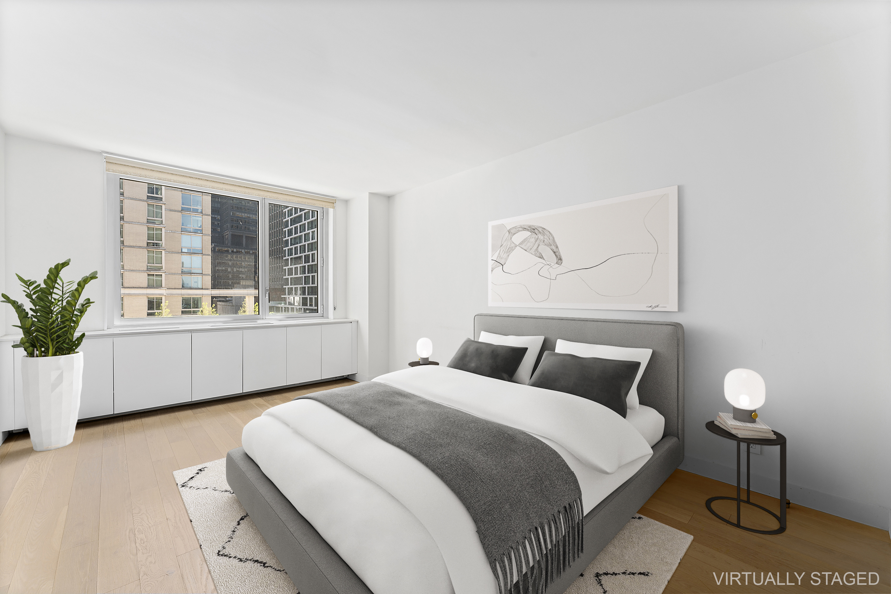 301 West 53rd Street, Unit 8J Manhattan, NY 10019 - Photo 2 of 14 a bedroom with a bed and a window