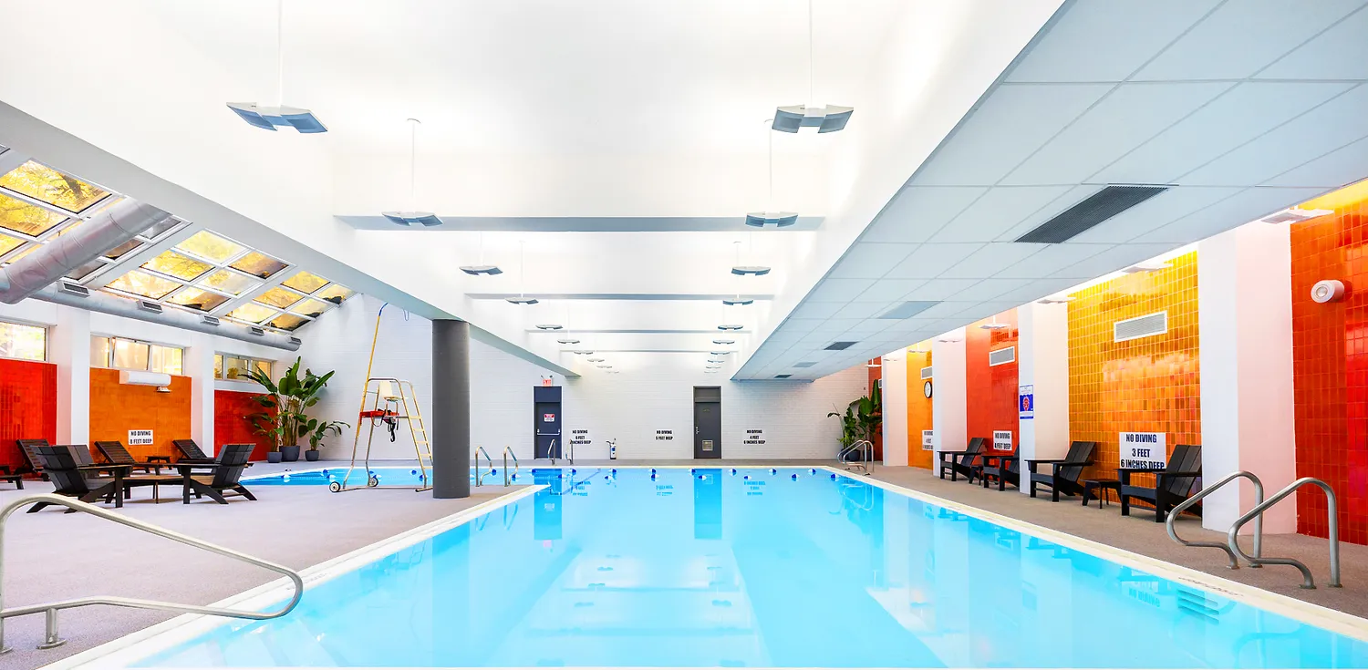 a view of swimming pool with outdoor seating