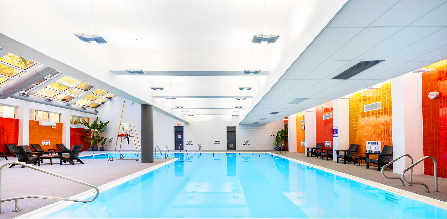 555 Main Street, Unit 1002 Manhattan, NY 10044 - Photo 10 of 14 a view of swimming pool with outdoor seating