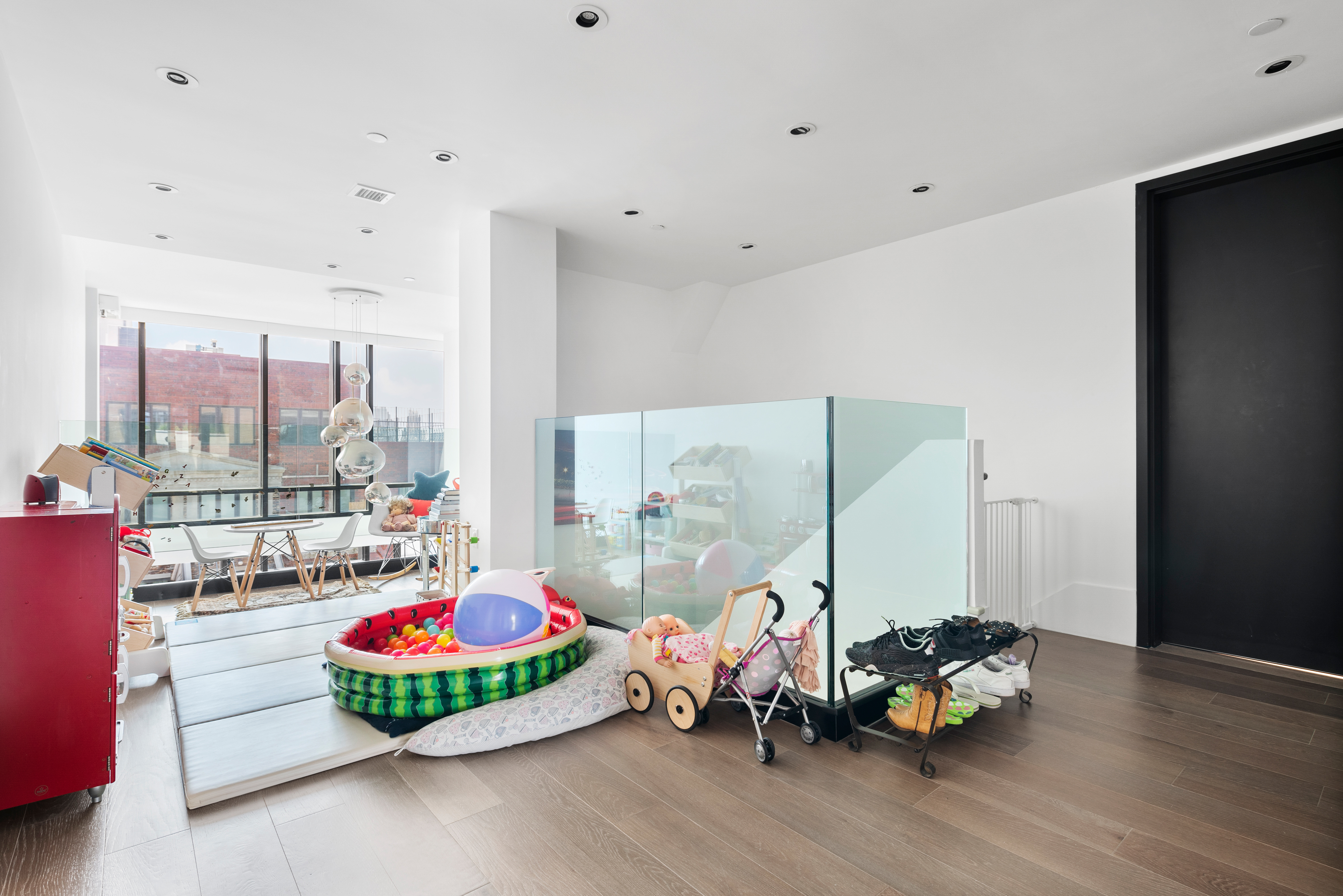 429 Kent Avenue, Unit D726 Brooklyn, NY 11249 - Photo 12 of 21 a play room with furniture