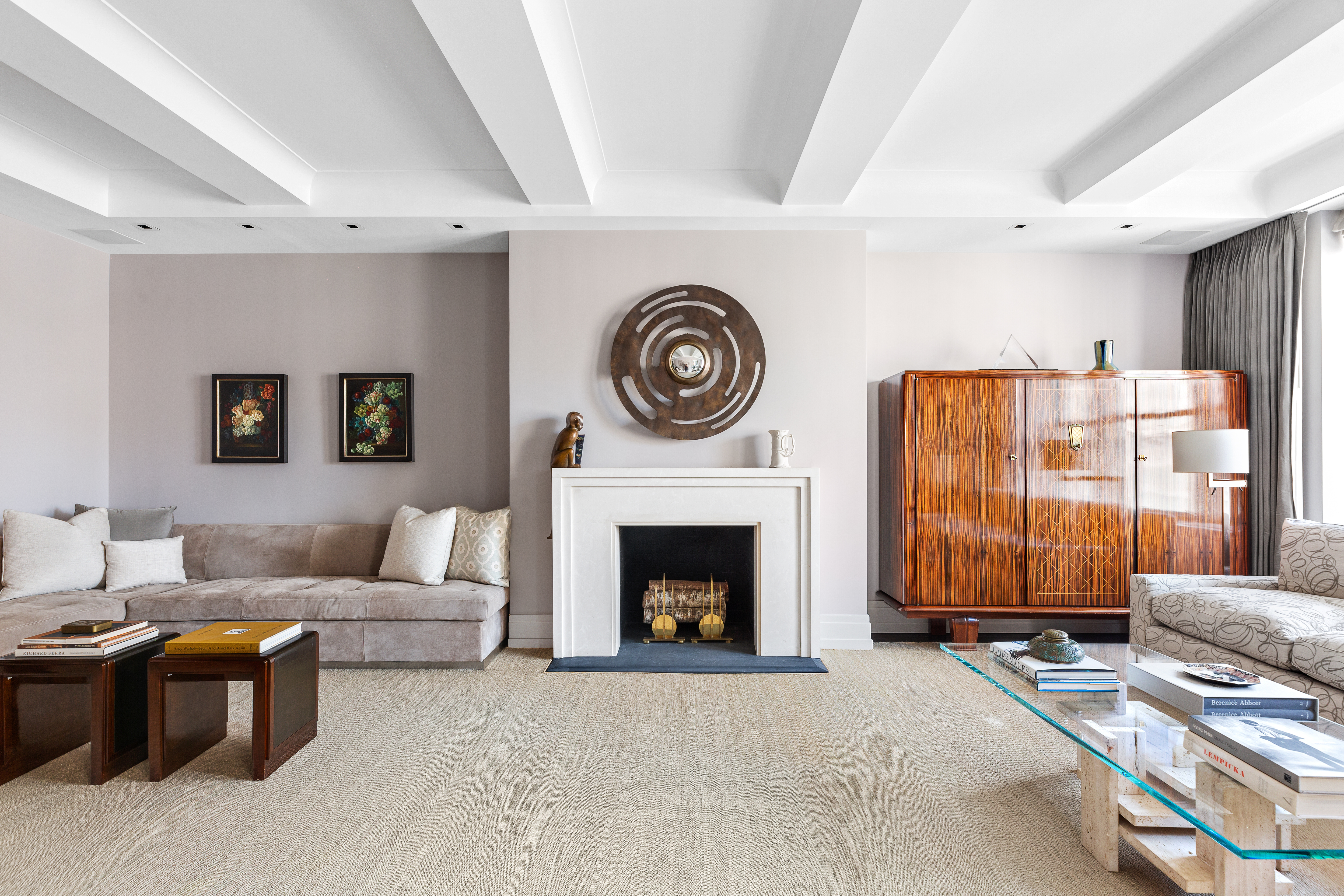 575 Park Avenue, Unit 902 Manhattan, NY 10065 - Photo 3 of 17 a living room with furniture and a fireplace