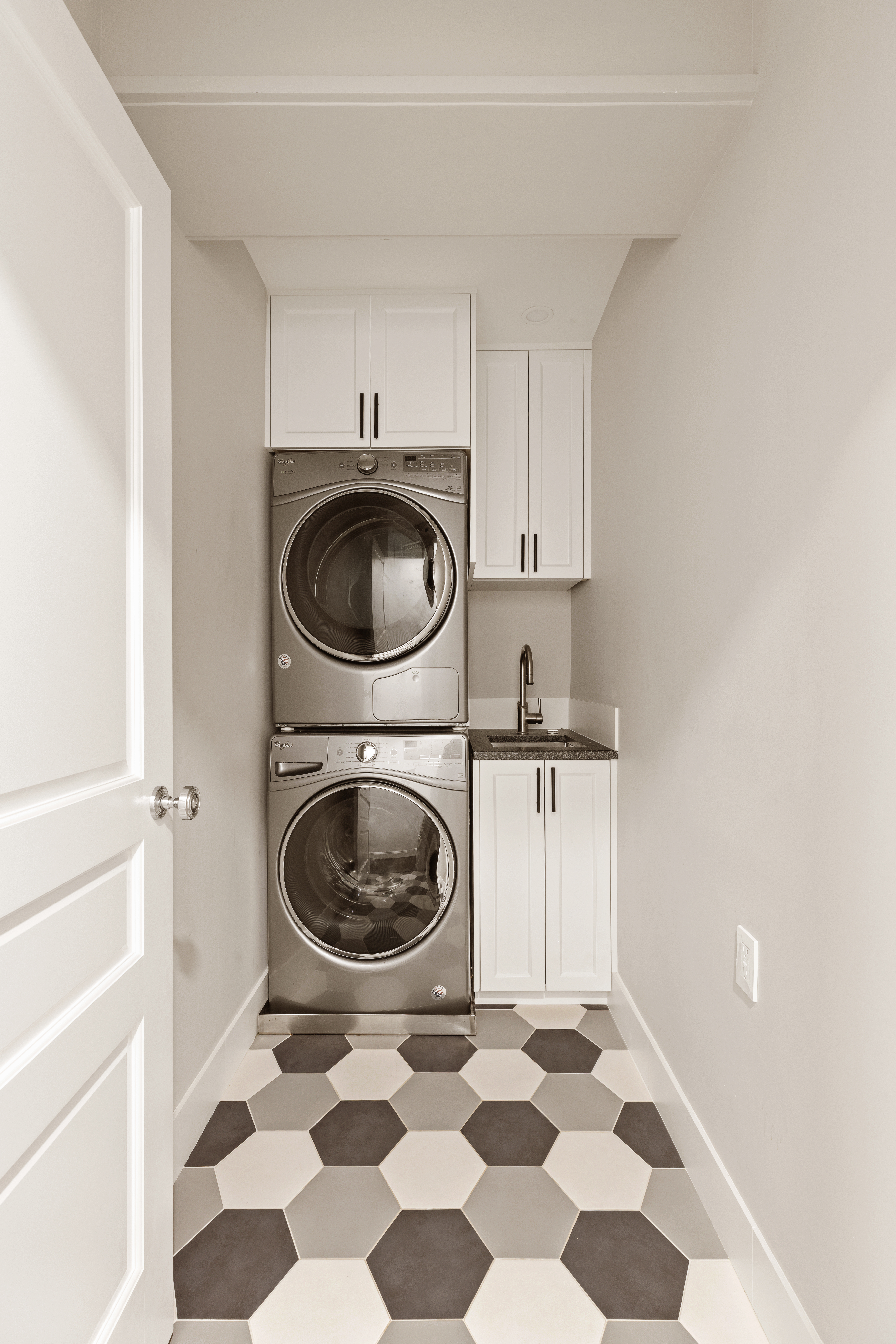 11 5th Avenue, Unit 8AB Manhattan, NY 10003 - Photo 8 of 15 a kitchen with a stove a sink and a washer