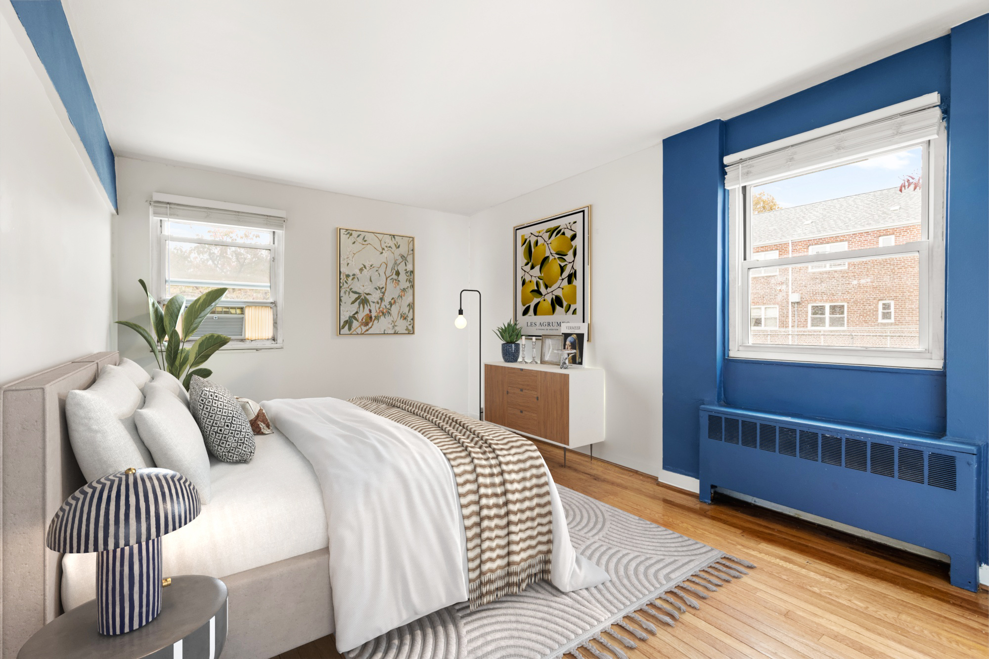 155-21 89th Street, Unit 2 Queens, NY 11414 - Photo 3 of 6 a bedroom with a bed and a window