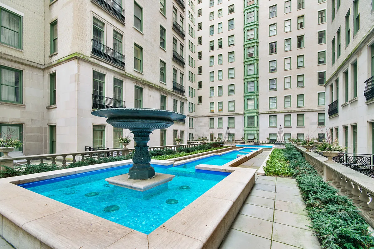 1 Central Park South, Unit 1804 Manhattan, NY 10019 - Photo 19 of 23 a front view of a building with swimming pool