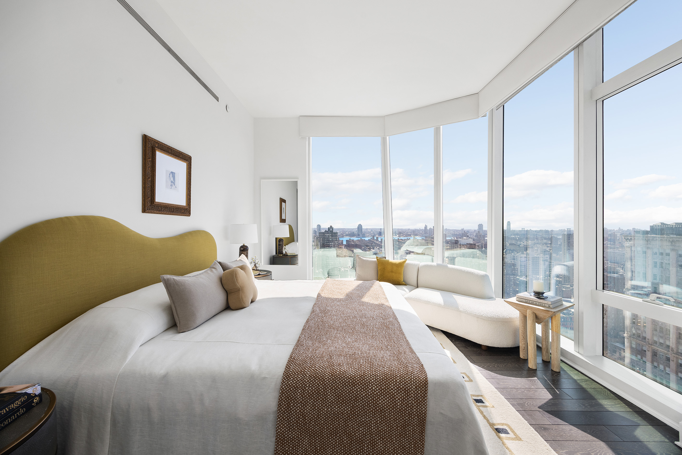 45 East 22nd Street, Unit 32B Manhattan, NY 10010 - Photo 21 of 36 a bedroom with a bed and a large window