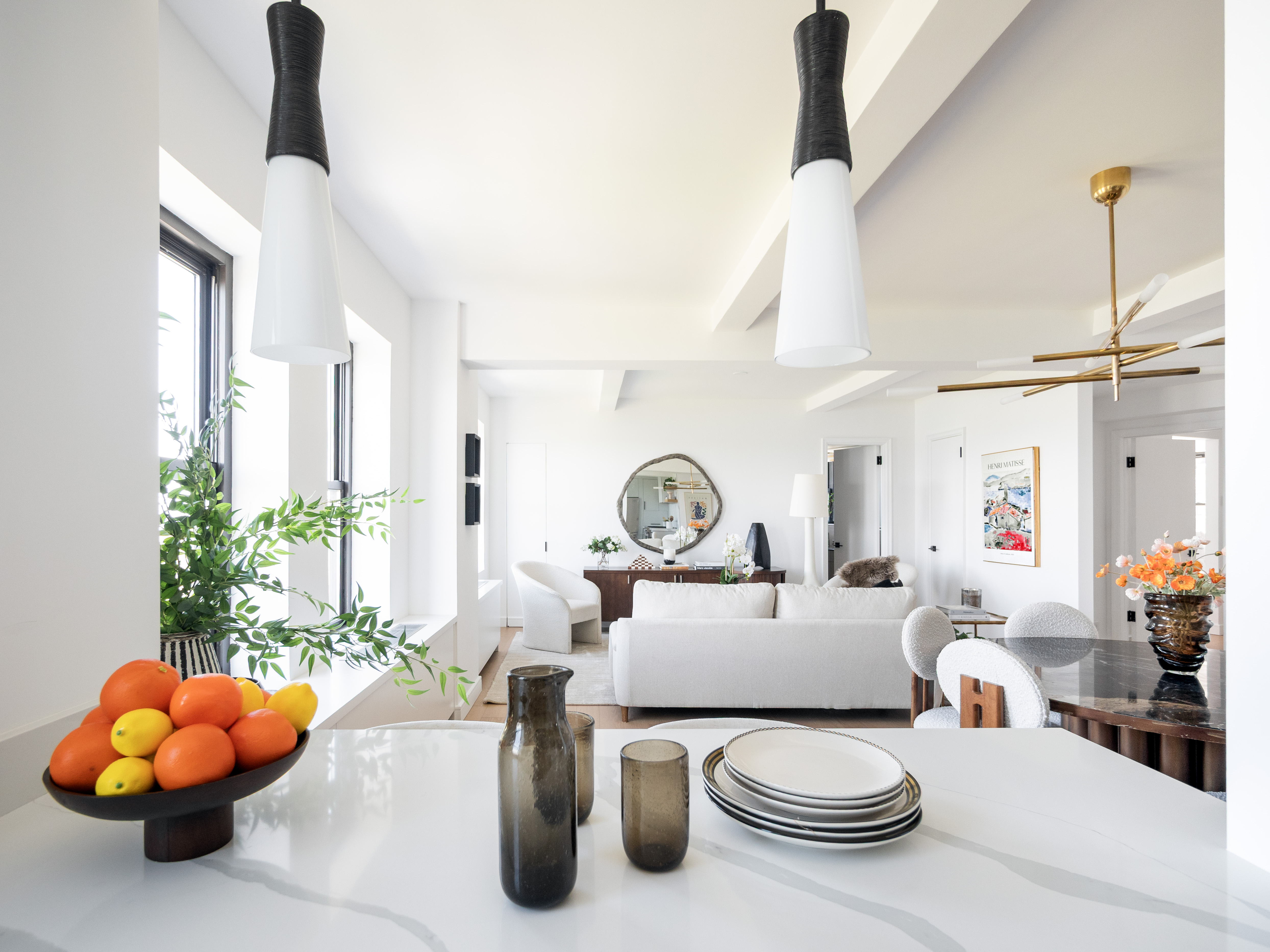 230 Riverside Drive, Unit 14AC Manhattan, NY 10025 - Photo 20 of 30 a living room with furniture and a chandelier