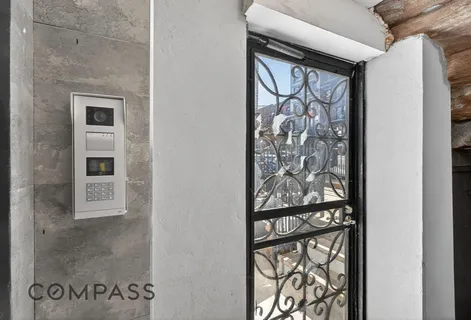a view of a door and a window