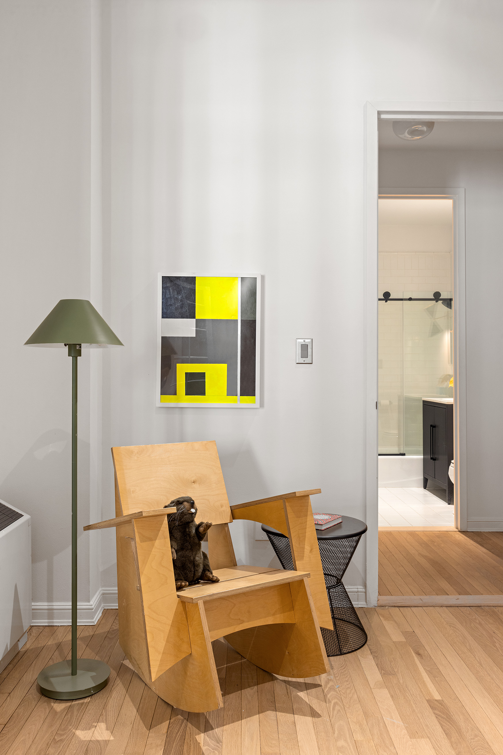 252 7th Avenue, Unit 9R Manhattan, NY 10001 - Photo 19 of 23 a living room with furniture and a table