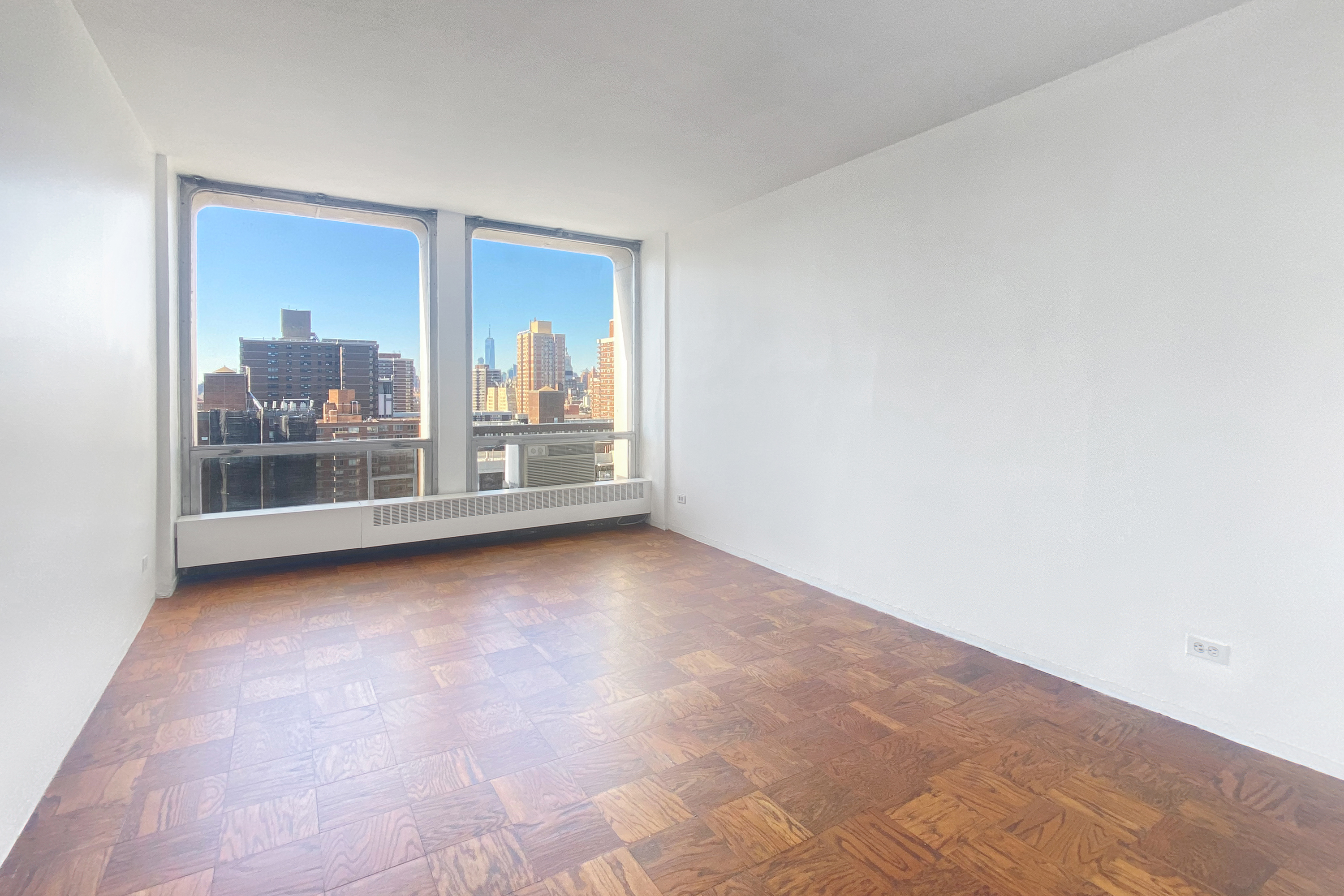 343 East 30th Street, Unit 19K Manhattan, NY 10016 - Photo 11 of 22 a view of a big room with sliding door