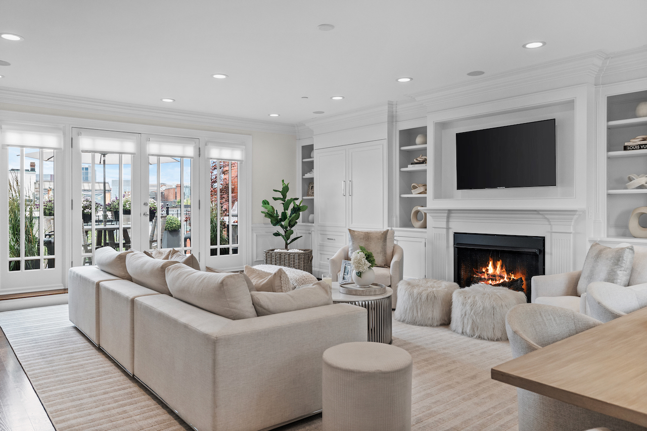 361 Beacon Street, Unit PH Boston, MA 02116 - Photo 7 of 9 a living room with furniture and a fireplace