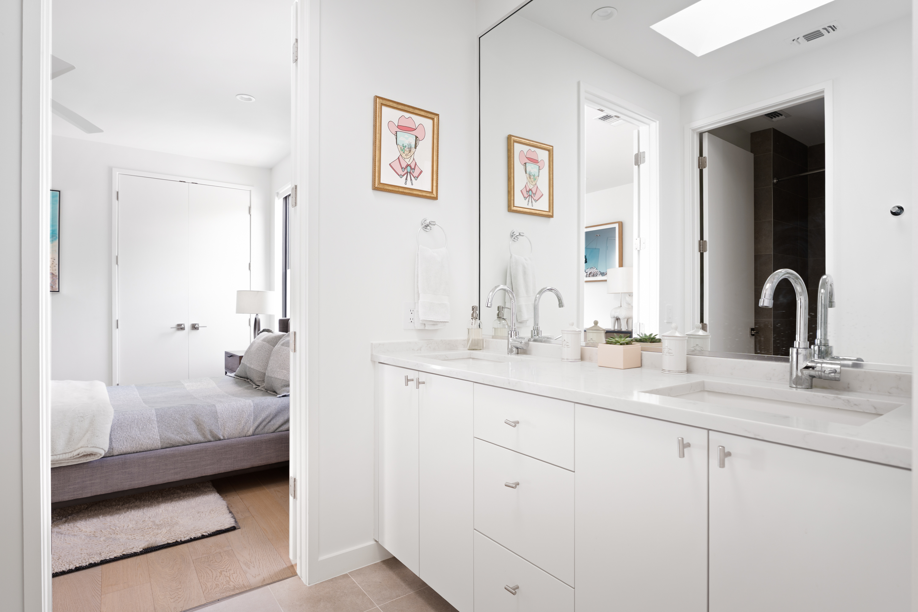 Address Upon Request Austin, TX 78704 - Photo 20 of 27 a en suite bathroom with double sink and a mirror