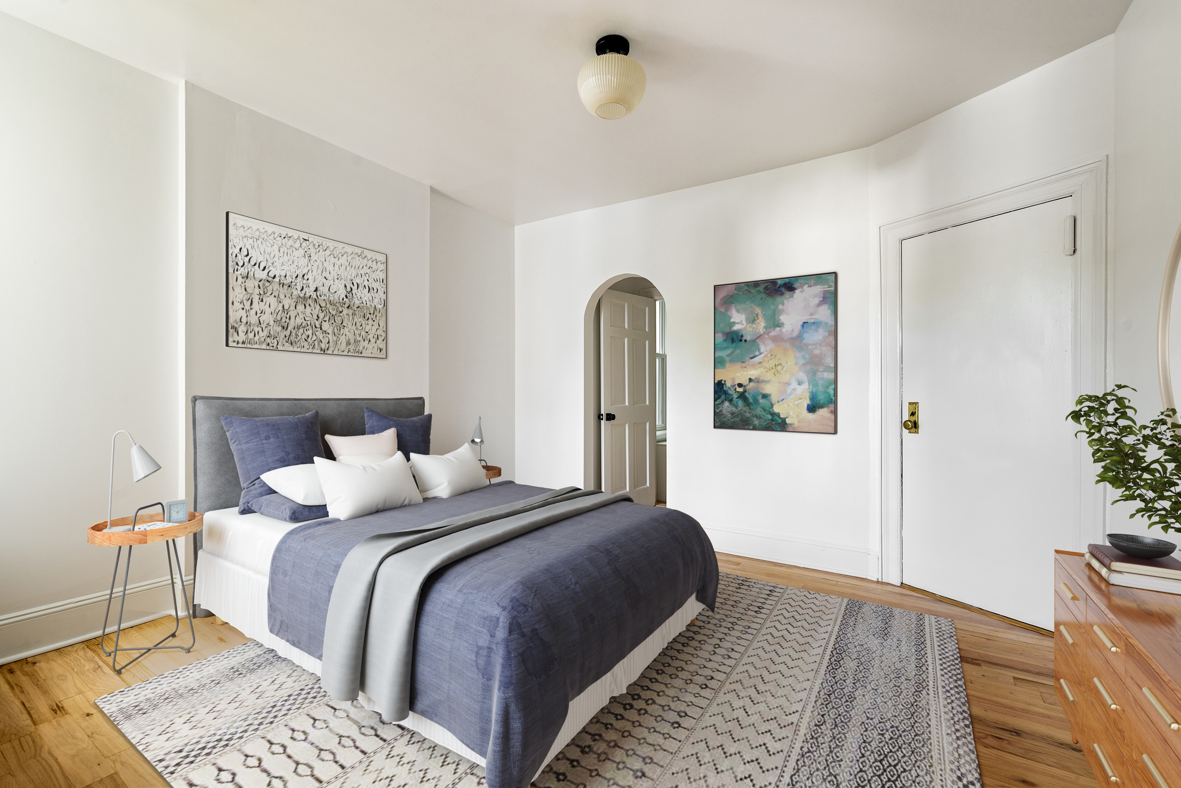 456 Prospect Avenue, Unit 3R Brooklyn, NY 11215 - Photo 9 of 16 a bedroom with a bed and a painting on the wall