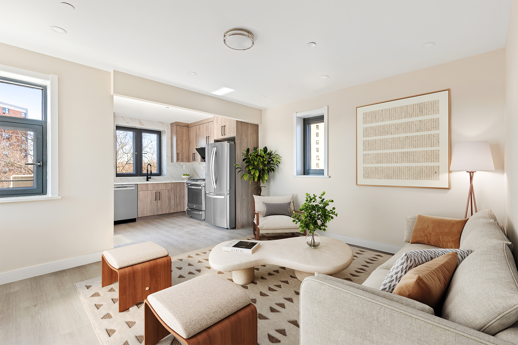 a living room with furniture and flowers
