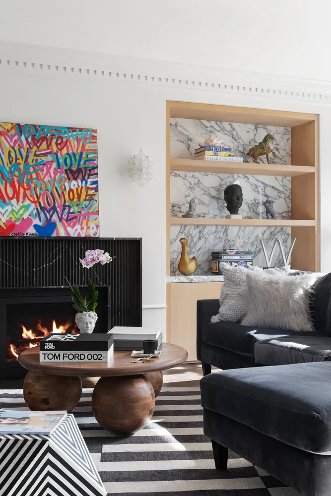 a living room with furniture and a rug