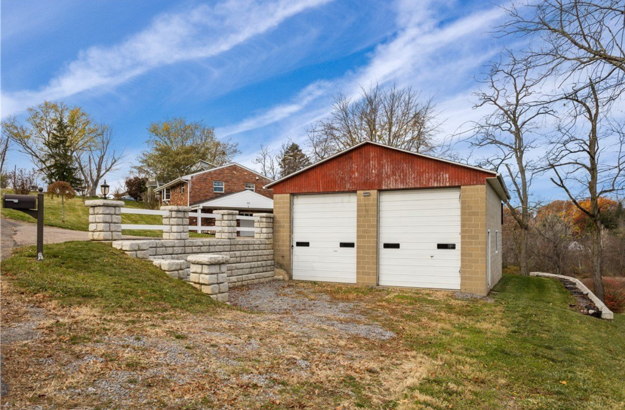 90 Davis Road Coraopolis, PA 15108 - Photo 2 of 2 a front view of a house with a yard