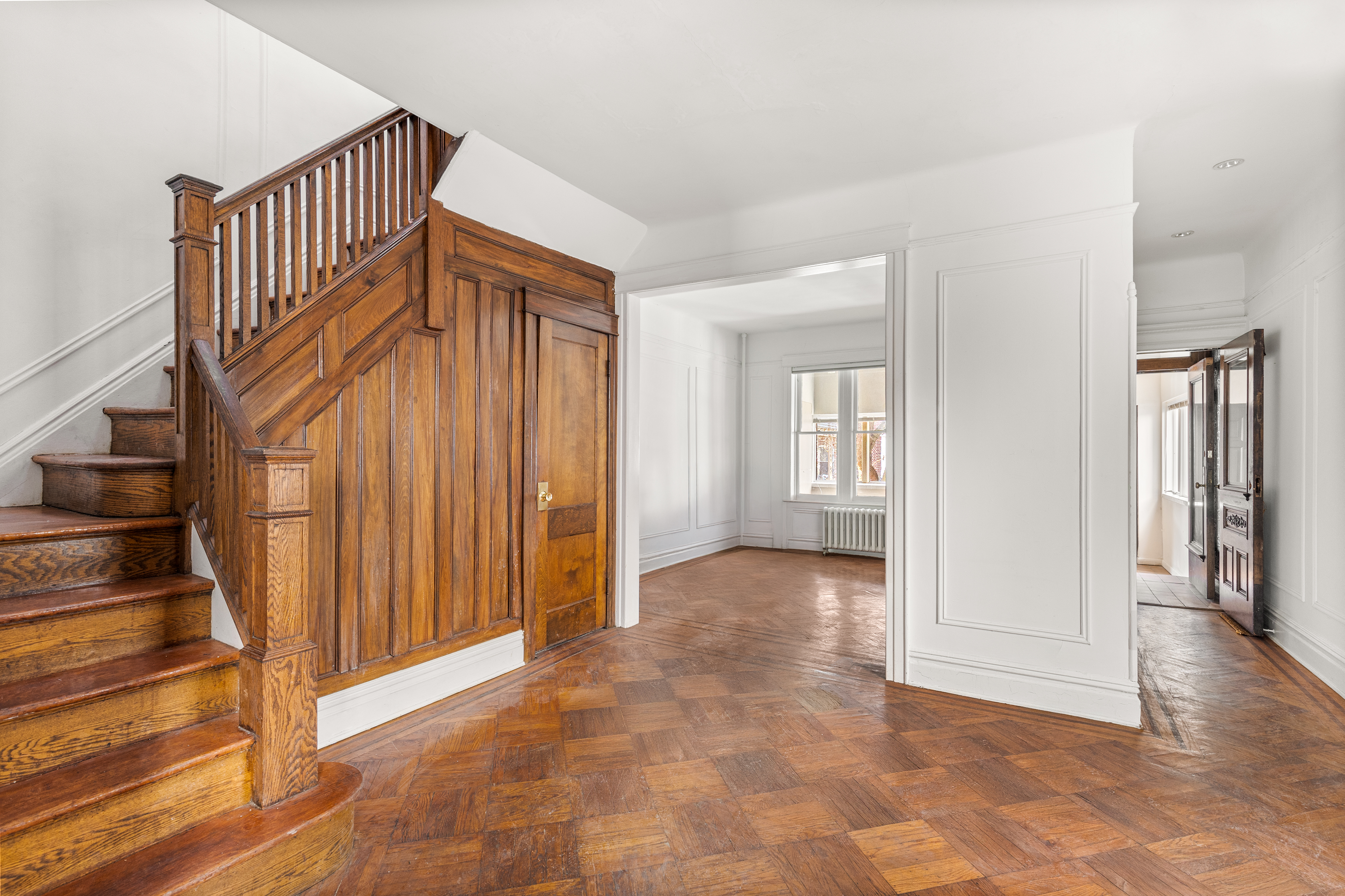 555 16th Street Brooklyn, NY 11215 - Photo 7 of 19 a view of a hallway with entryway wooden floor and front door