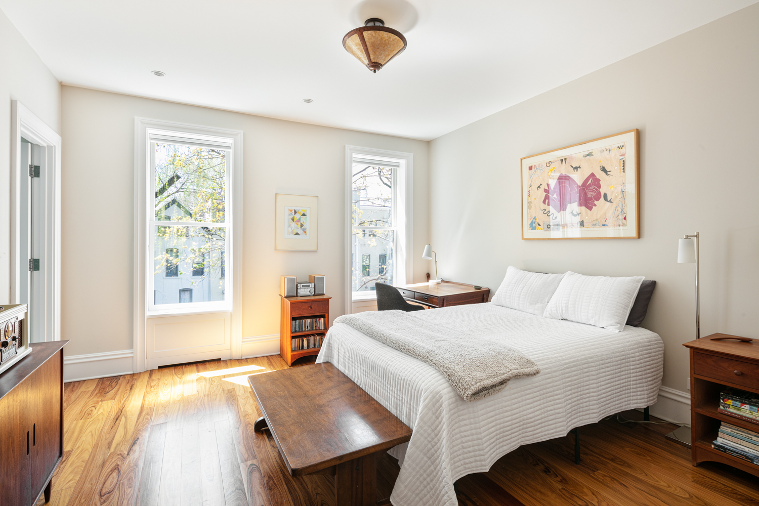 380 3rd Street, Unit PARLOR Brooklyn, NY 11215 - Photo 11 of 19 a bedroom with a bed and wooden floor
