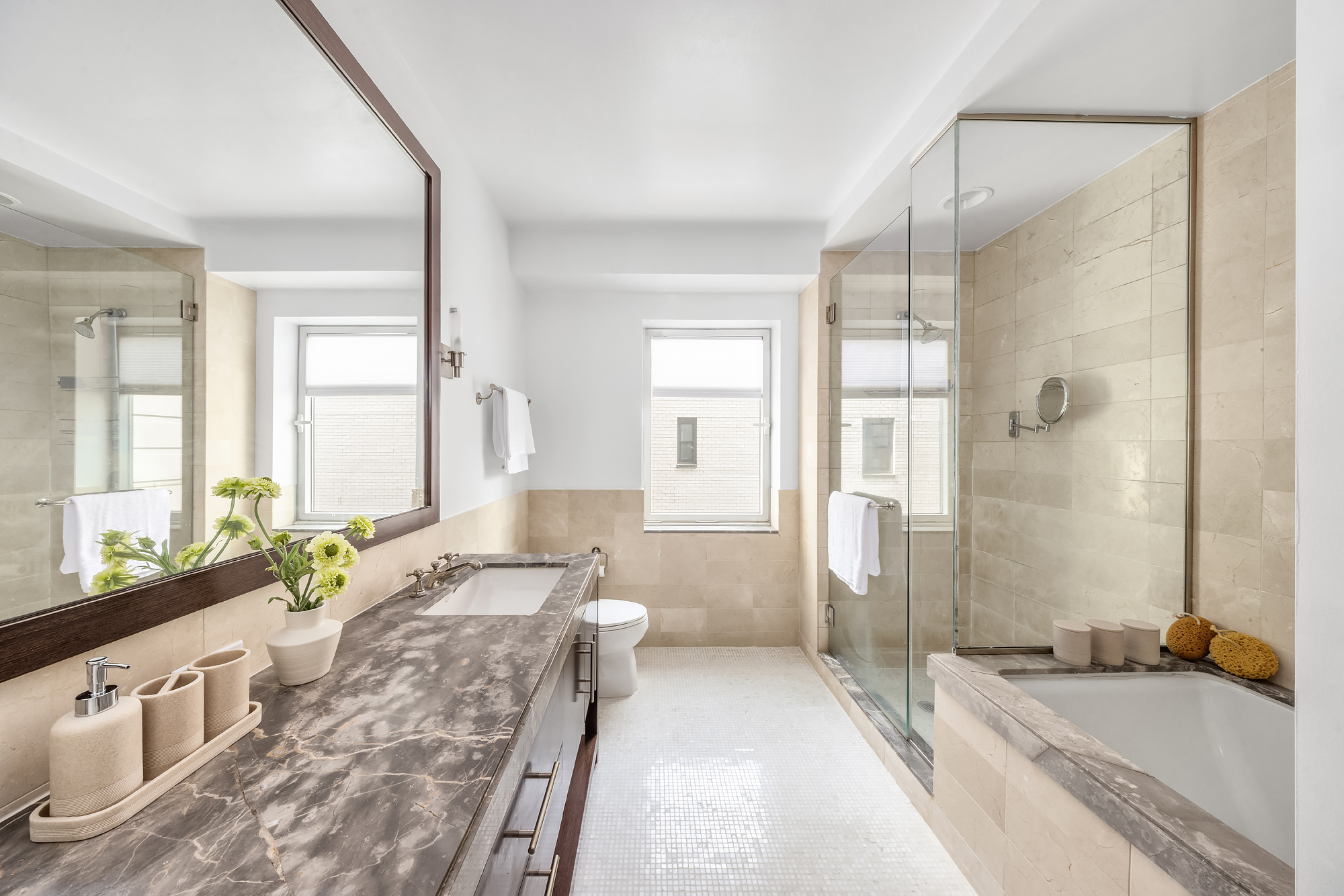 408 East 79th Street, Unit 14B Manhattan, NY 10075 - Photo 11 of 18 a spacious bathroom with sink shower and a bathtub