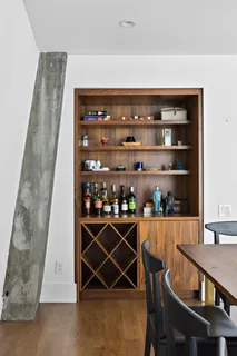 a view of a chairs and table in a room