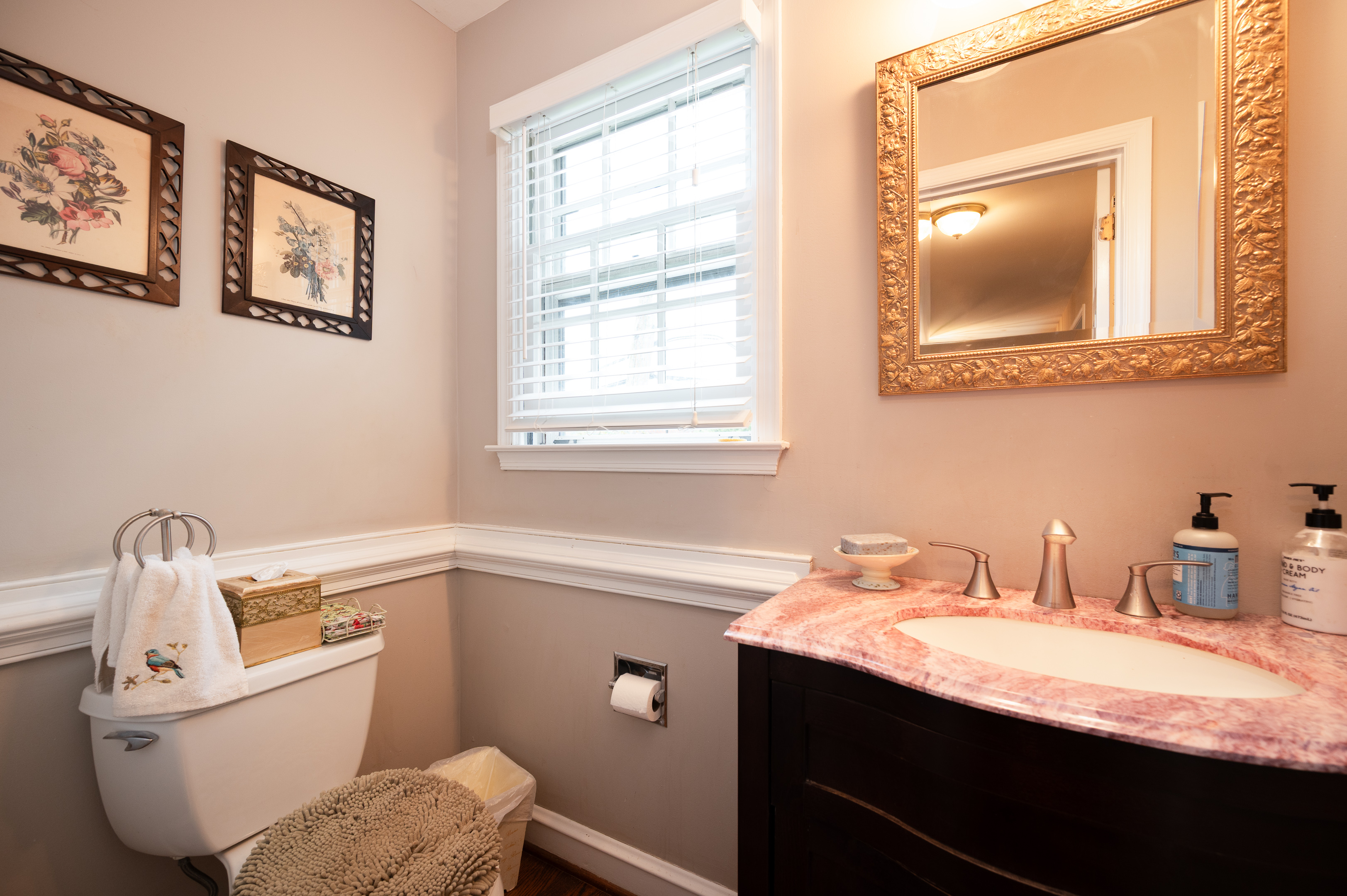 700 Blackshire Road Wilmington, DE 19805 - Photo 21 of 40 a bathroom with a granite countertop sink mirror vanity and toilet