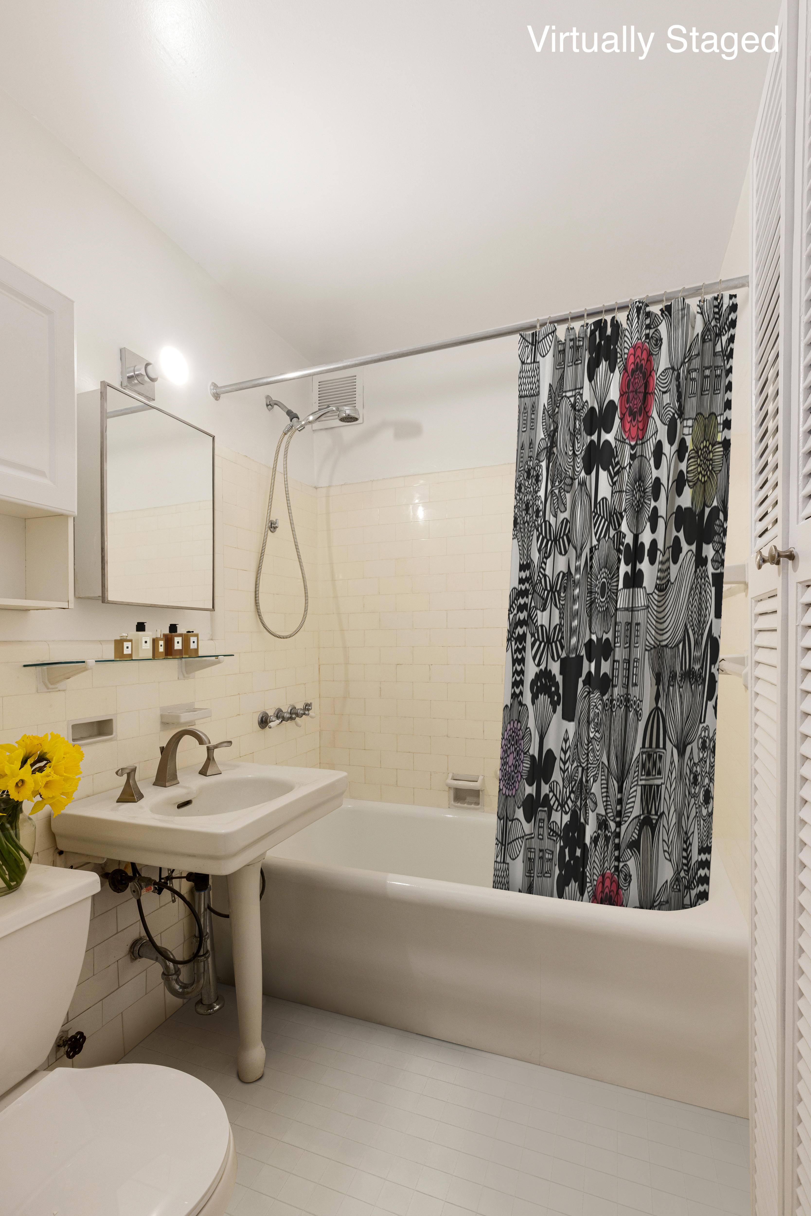 235 West 102nd Street, Unit 4E Manhattan, NY 10025 - Photo 4 of 19 a bathroom with a sink toilet and shower