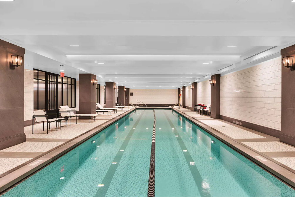 10 Madison Square West, Unit 9G Manhattan, NY 10010 - Photo 12 of 13 a view of a kitchen with a large window
