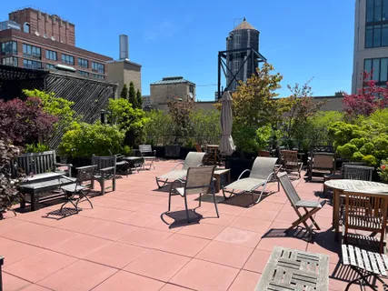 a view of a terrace with sitting area