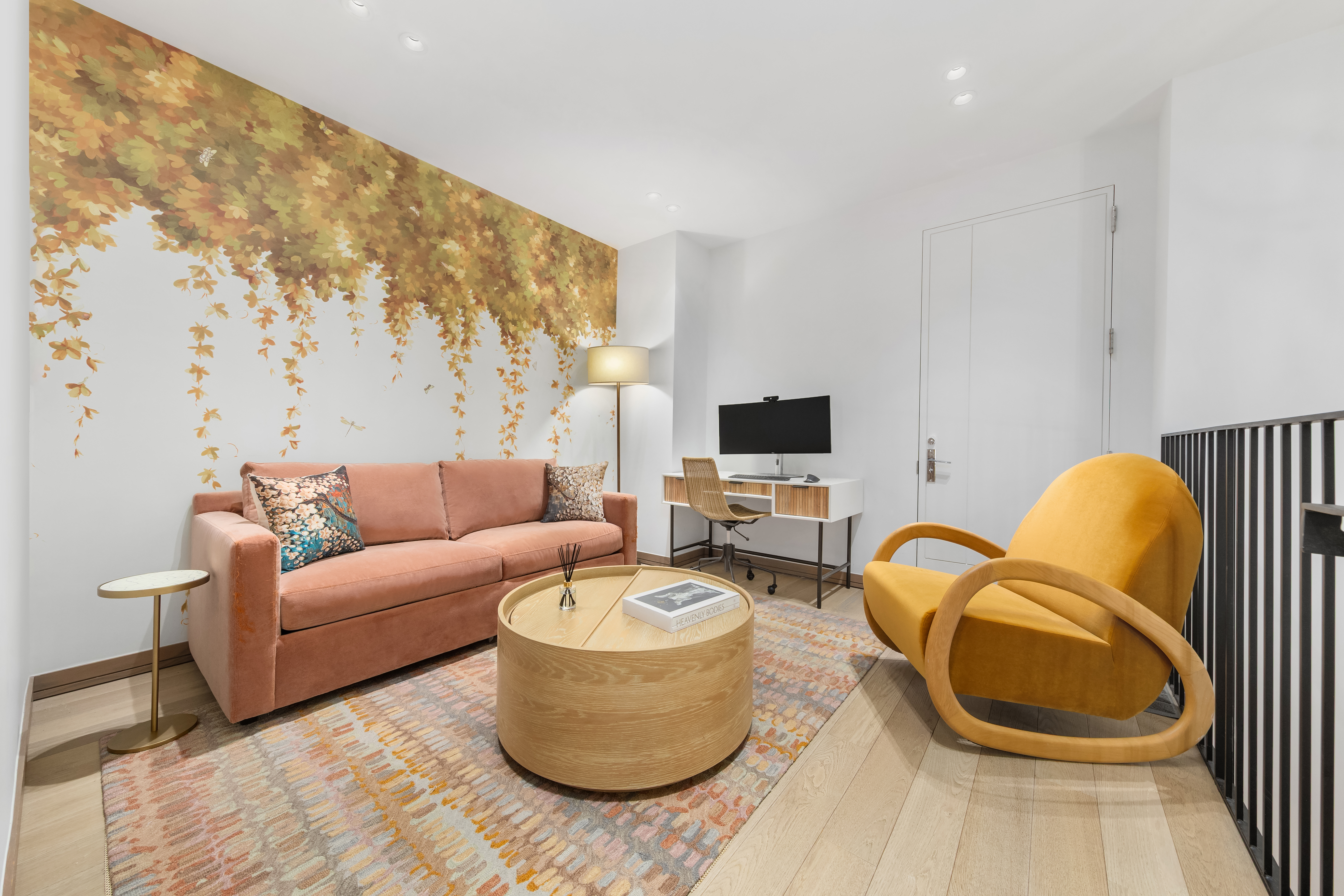 90 Lexington Avenue, Unit MC Manhattan, NY 10016 - Photo 12 of 26 a living room with furniture and a flat screen tv