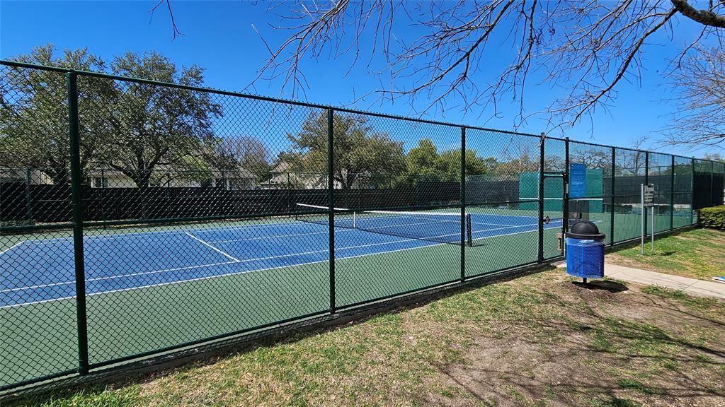 10608 Pointe View Drive Austin, TX 78738 - Photo 35 of 46 a view of a tennis court