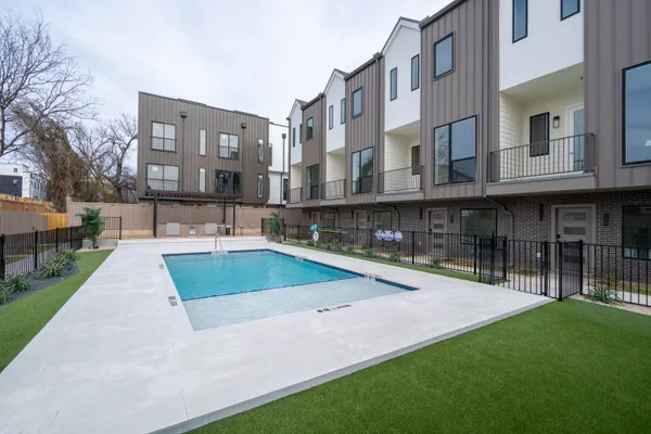 a view of a building with a swimming pool