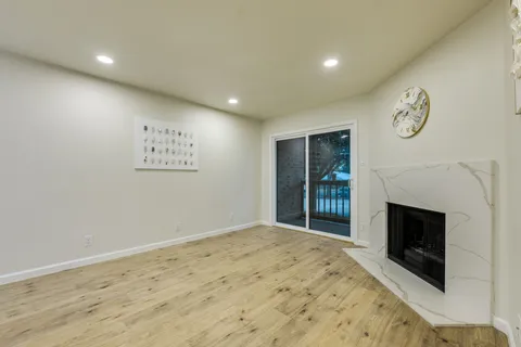 a view of a livingroom with a fireplace