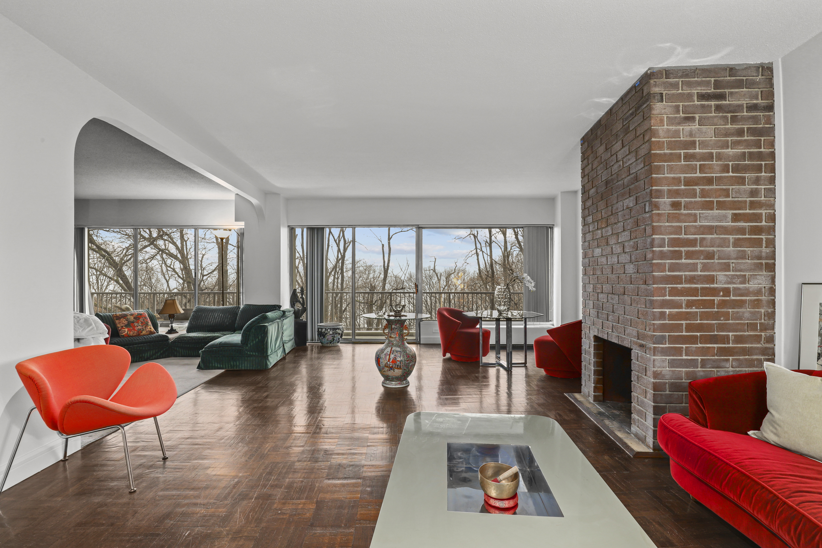 4455 Douglas Avenue, Unit 3FE Bronx, NY 10471 - Photo 7 of 53 a living room with furniture fireplace and a large window