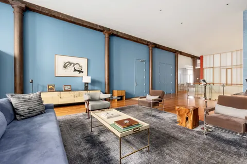 a living room with furniture and a couch