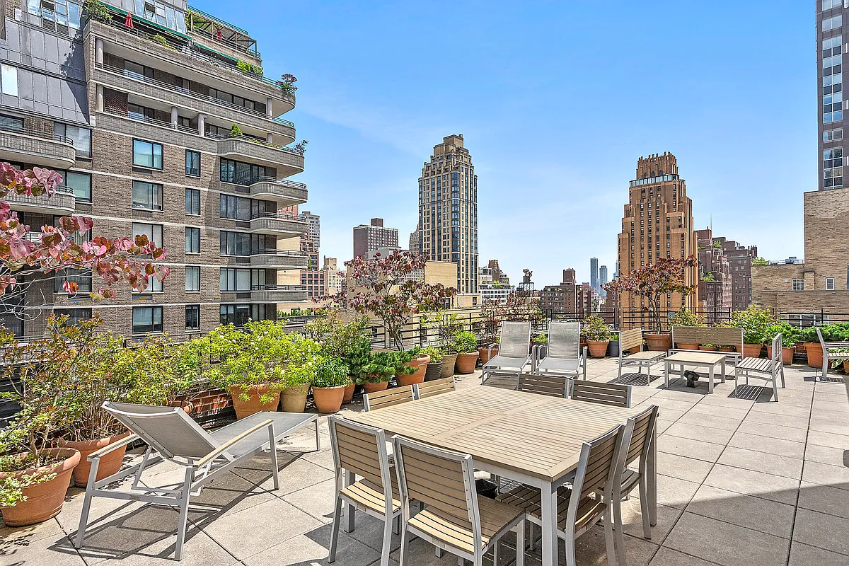 310 East 49th Street, Unit 7B Manhattan, NY 10017 - Photo 9 of 10 a view of a city with tall buildings