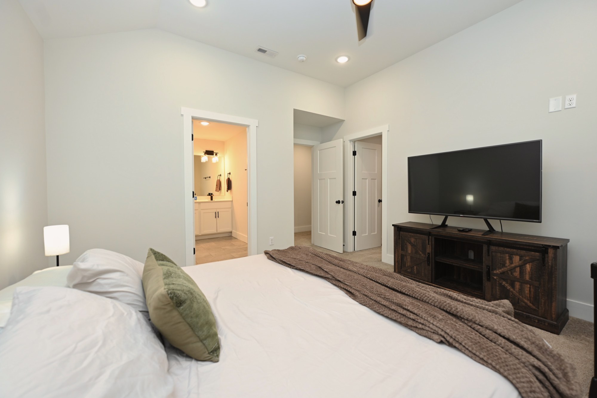 211 Golf Club Lane Springfield, TN 37172 - Photo 22 of 41 a bedroom with a bed and a flat screen tv