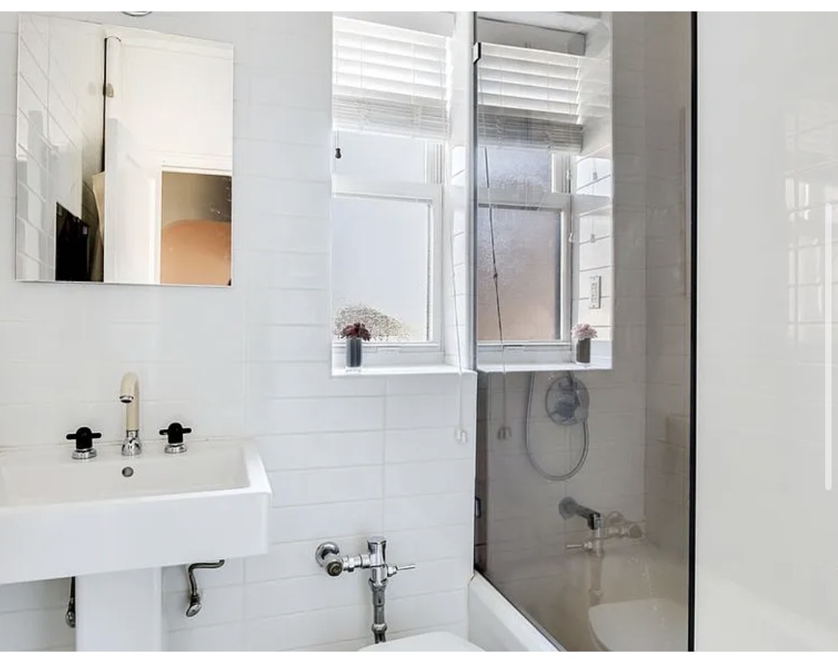 357 West 55th Street, Unit 6M Manhattan, NY 10019 - Photo 6 of 8 a bathroom with a bathtub and a shower