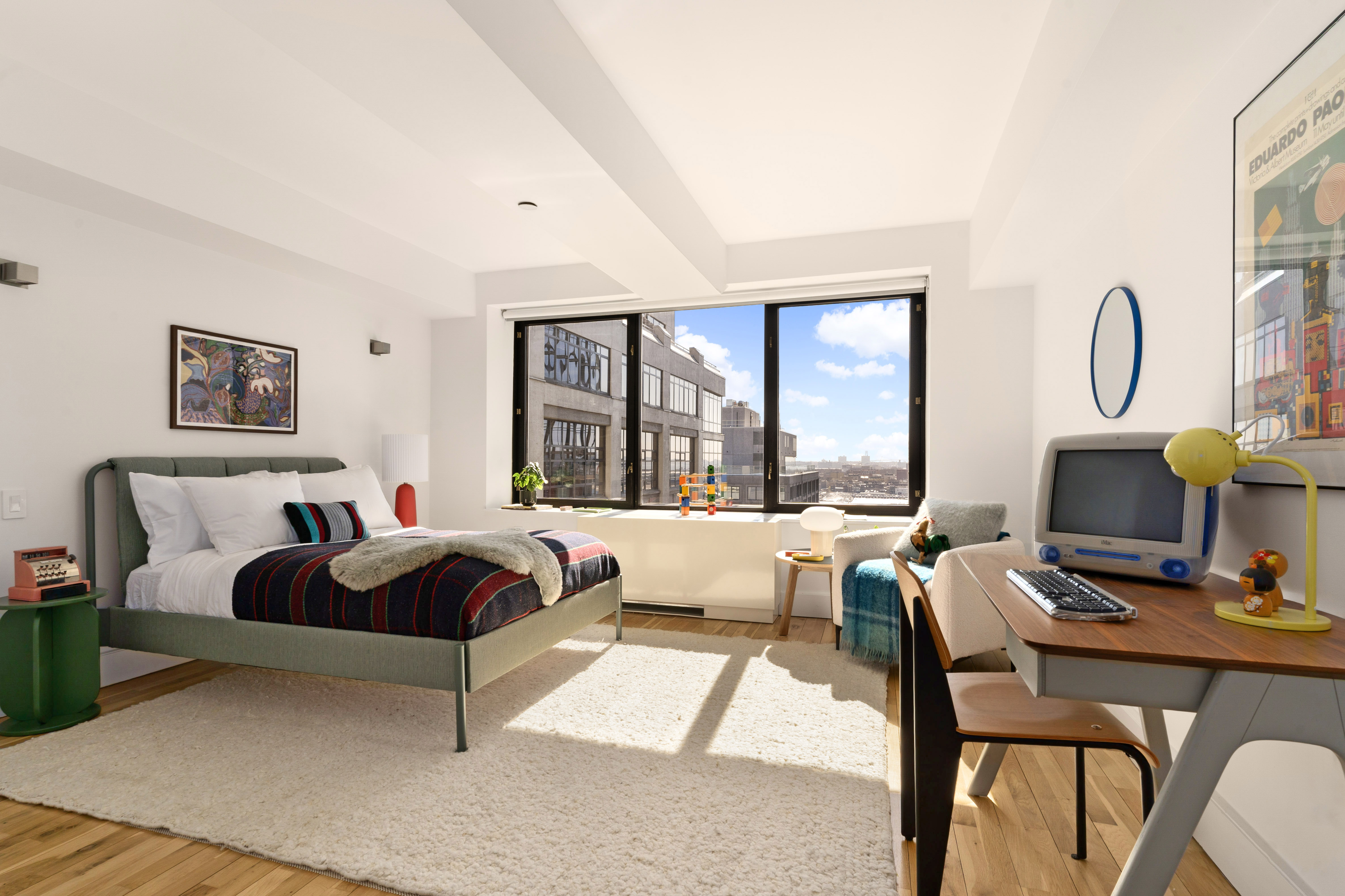 360 Furman Street, Unit 1041/1042 Brooklyn, NY 11201 - Photo 14 of 30 a living room with furniture and a flat screen tv