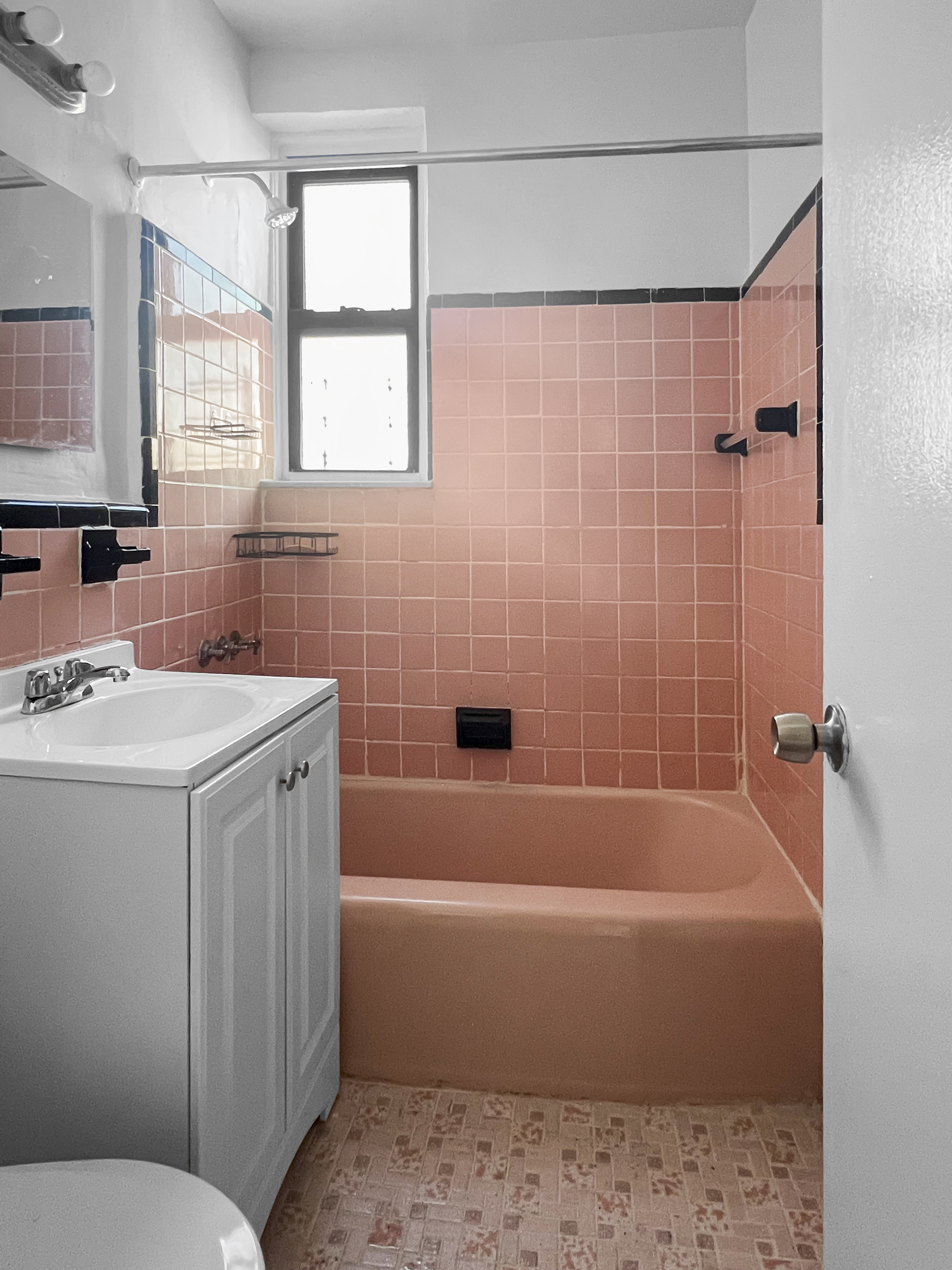 1466 East Gun Hill Road, Unit 1B Bronx, NY 10469 - Photo 5 of 5 a bathroom with a sink a toilet and shower