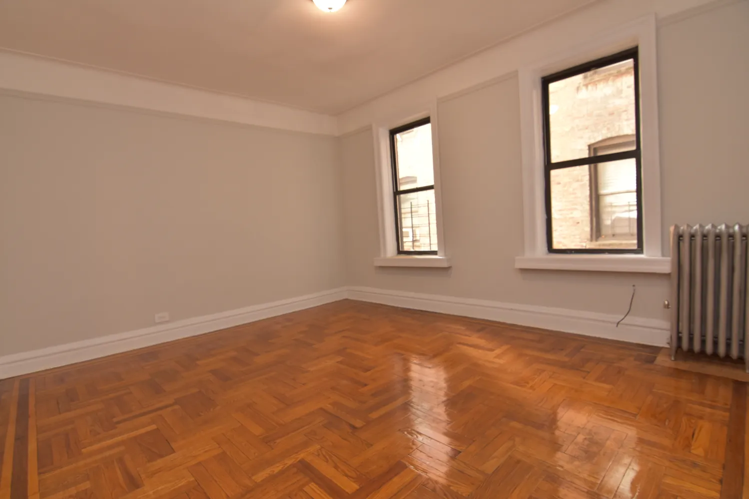 an empty room with windows