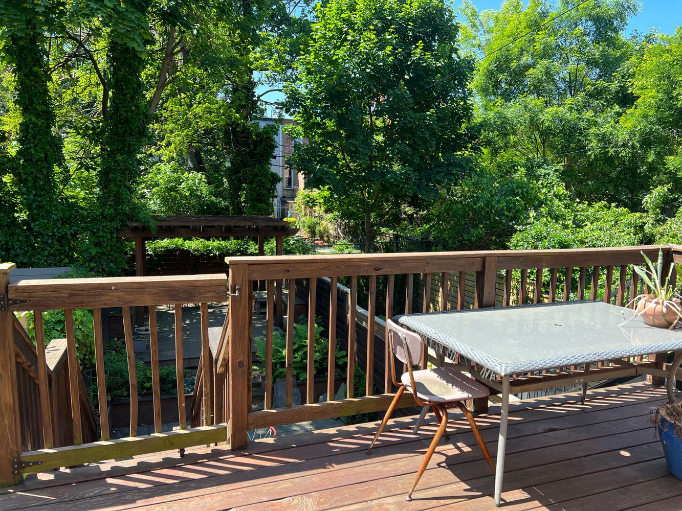 1124 Prospect Place, Unit PLEX Brooklyn, NY 11213 - Photo 7 of 15 a view of a wooden deck and outdoor space