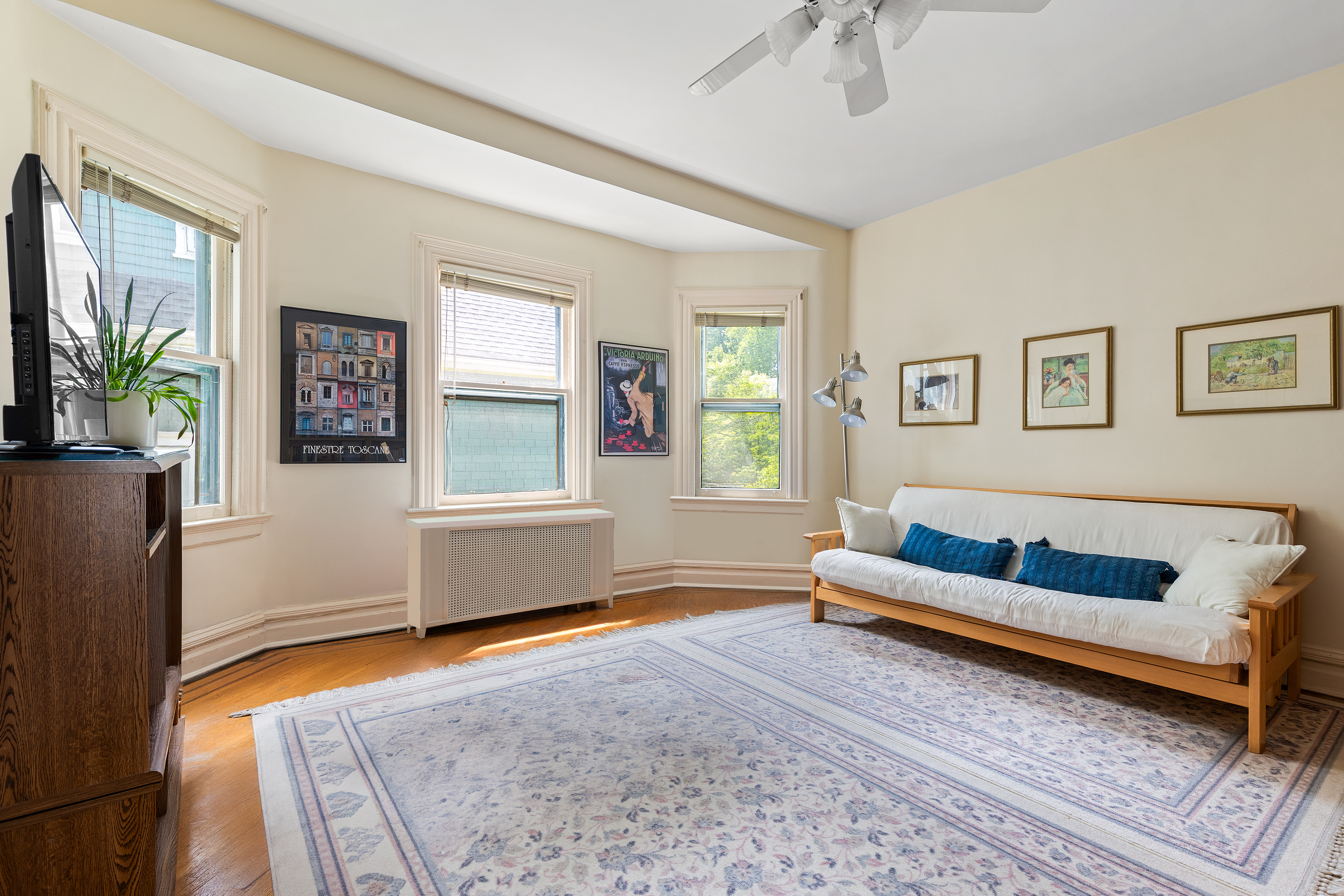 492 Westminster Road Brooklyn, NY 11218 - Photo 13 of 21 a living room with furniture and a window