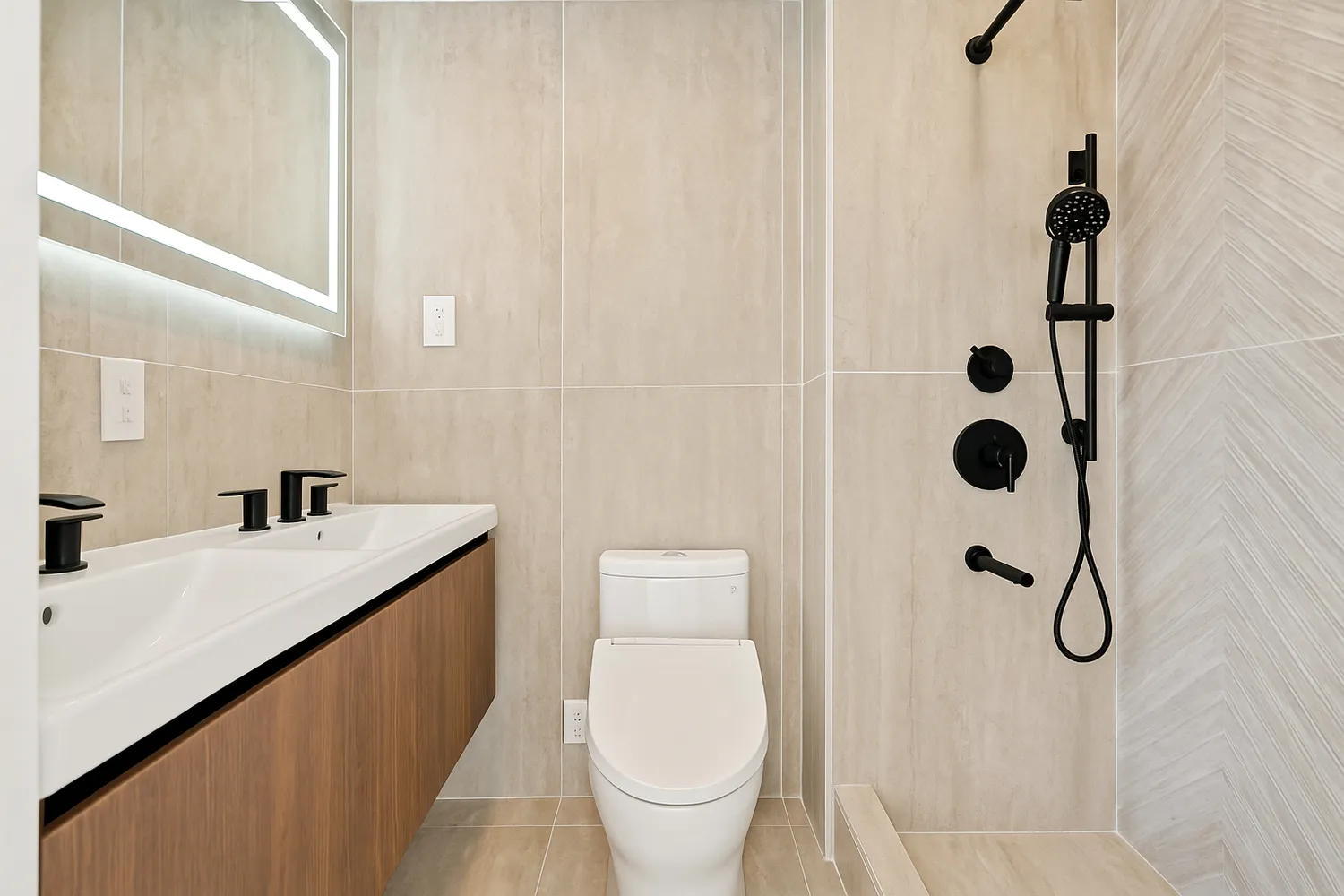 a bathroom with a granite countertop sink a toilet and shower