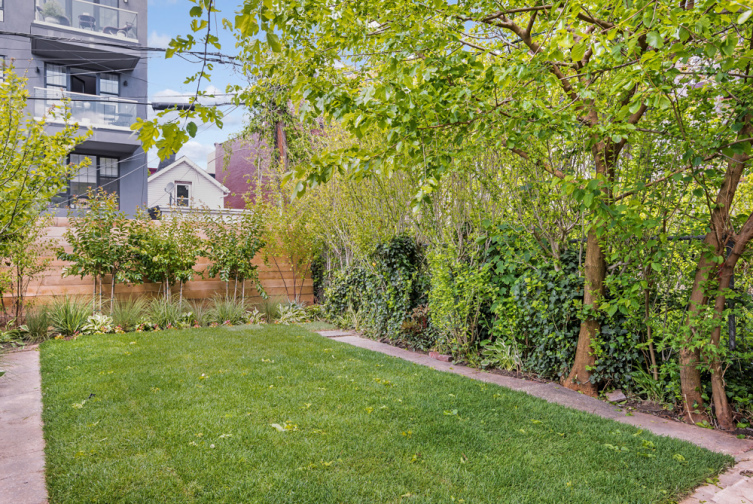611 Macon Street Brooklyn, NY 11233 - Photo 13 of 15 a view of a house with a yard