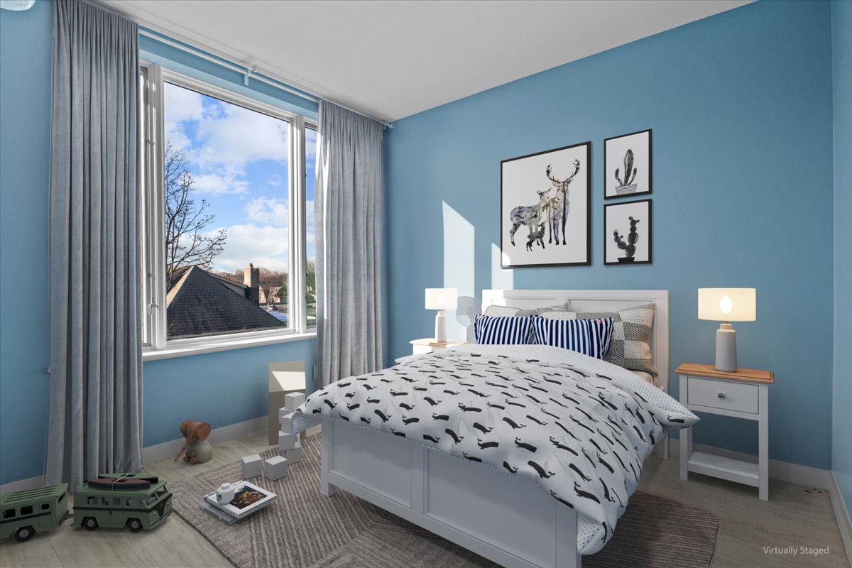 1972 Ocean Avenue, Unit 4A Brooklyn, NY 11230 - Photo 3 of 18 a bedroom with a bed and a painting on the wall