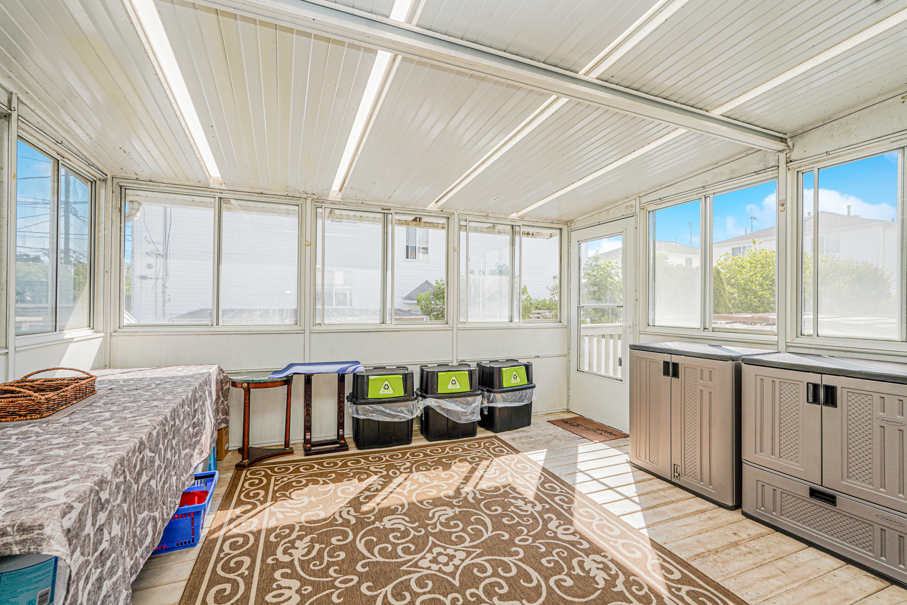 287 Greaves Avenue Staten Island, NY 10308 - Photo 14 of 35 a bed room with furniture and a window