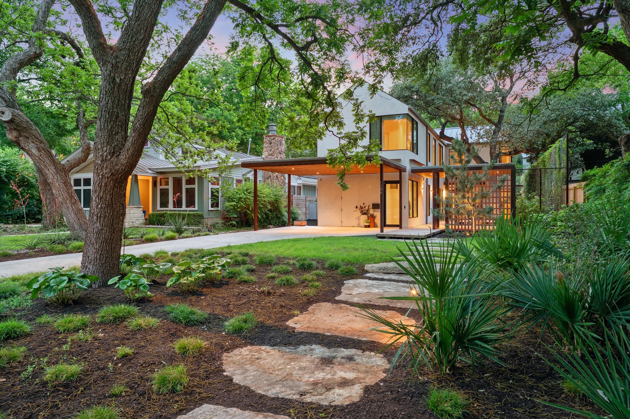 1206 Bickler Road Austin, TX 78704 - Photo 1 of 65 a front view of a house with a yard and trees