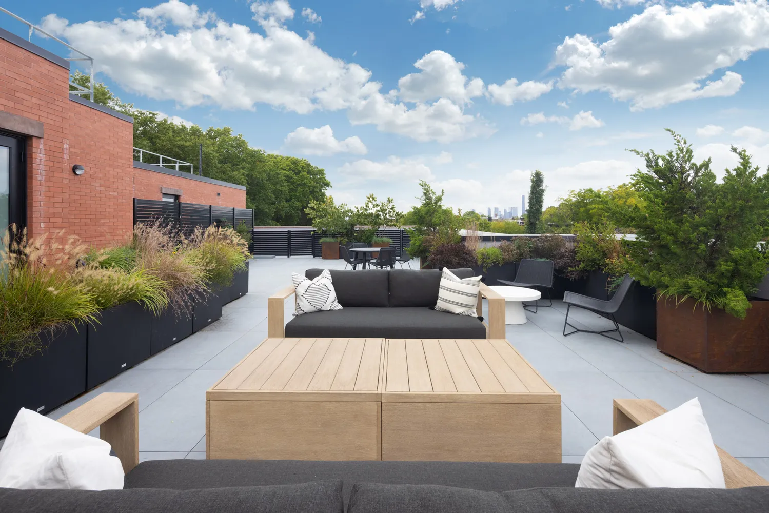 a view of a roof deck with couches