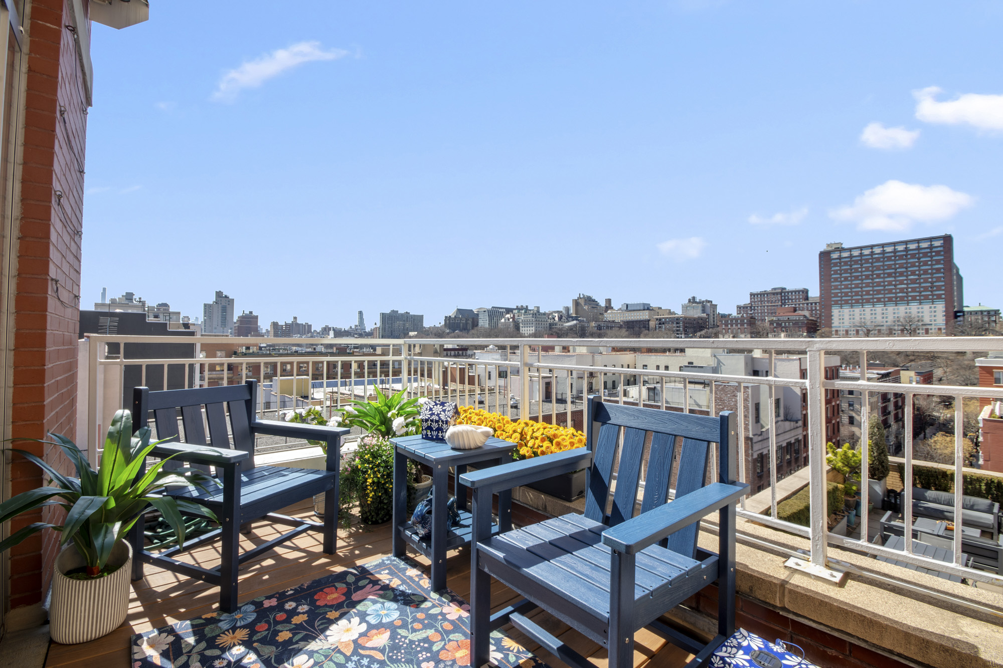 301 West 118th Street, Unit PH1F Manhattan, NY 10026 - Photo 6 of 15 a terrace with outdoor seating and city view